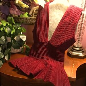 Ronny Kobo Burgundy Red V-Neck Peplum knit Top. Size XS